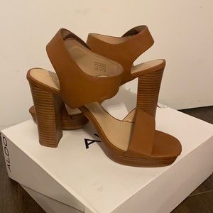 Size 10US(Women’s), never worn, brown heel boots. Comes with original box